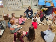 FBLA members reading to preschool